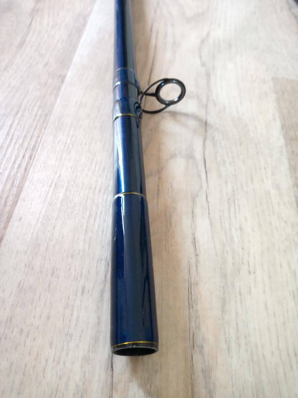 Te koop z.g.a.n. 2 delig strandhengel voor reel