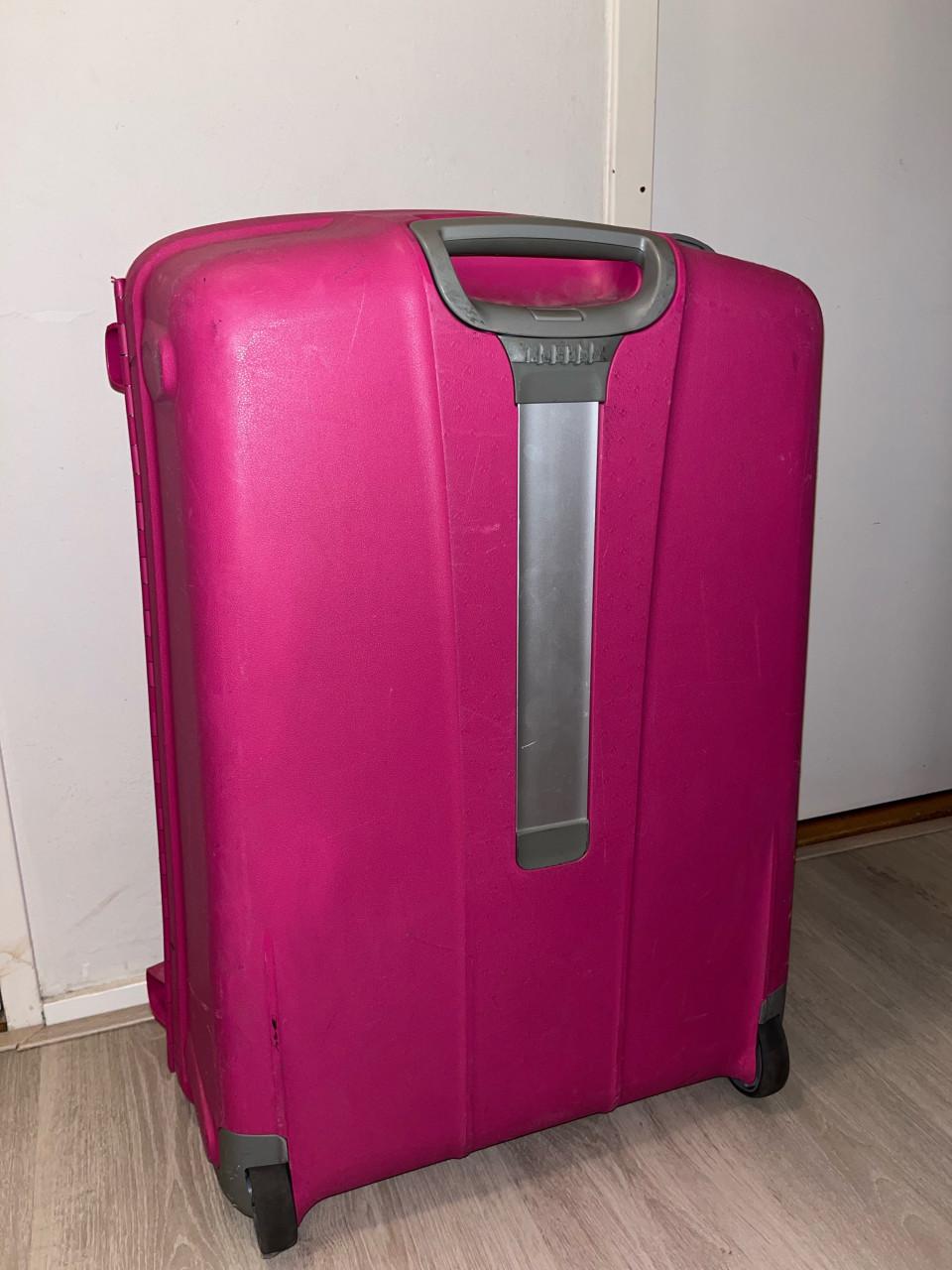 Grote roze Samsonite koffer