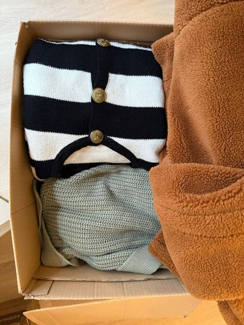 Truien, vesten en lange teddyjas