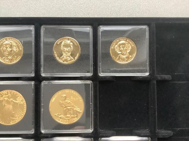 11 penningen / munten USA in luxe houten cassette.