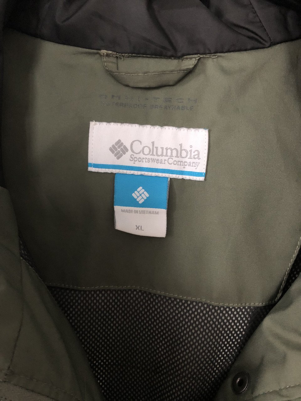 Colombia Regenjasje XL = 40-42
