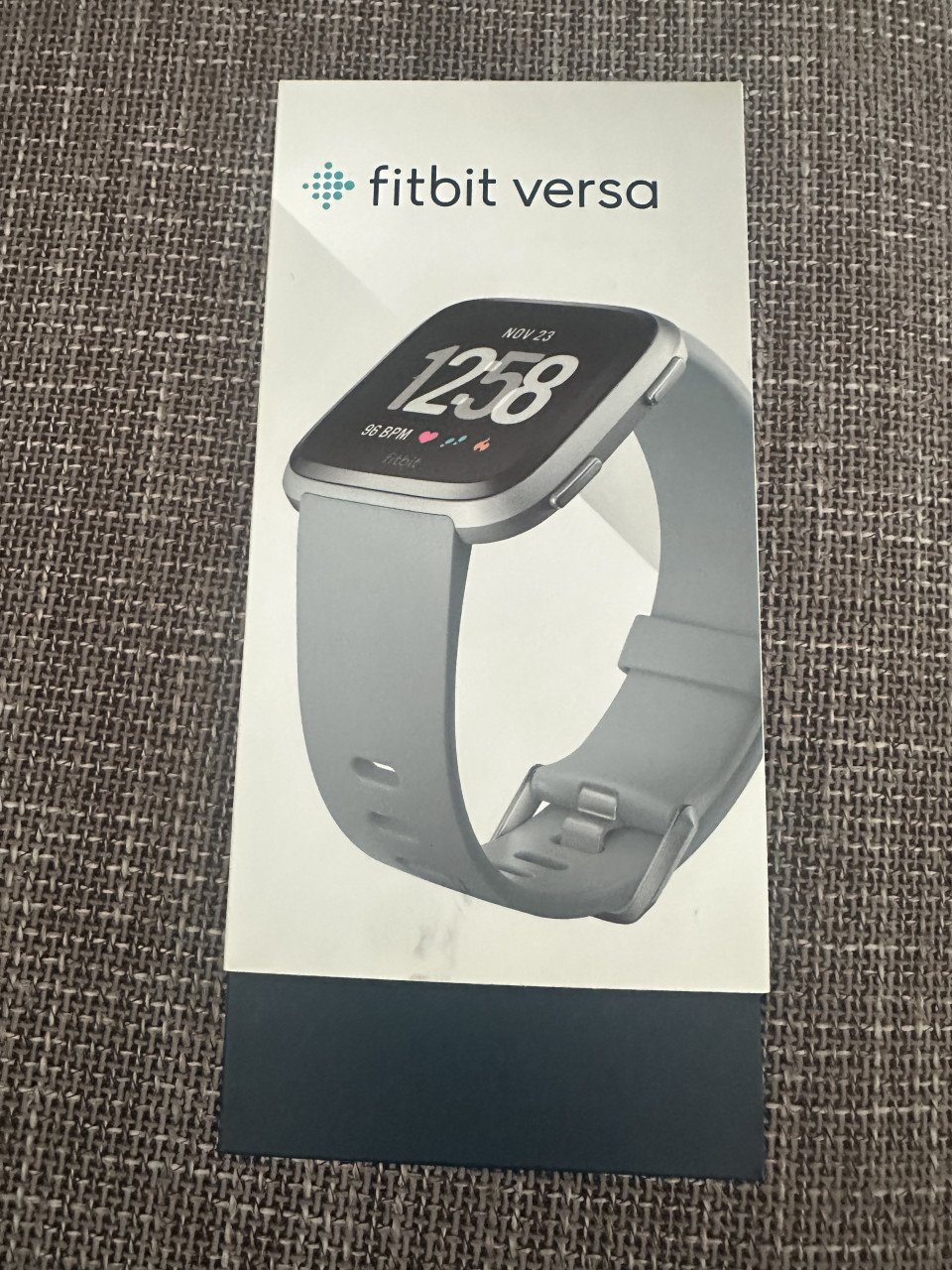 Fitbit Versa met grijs bandje