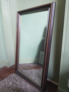 Oude spiegel in nieuw lijst