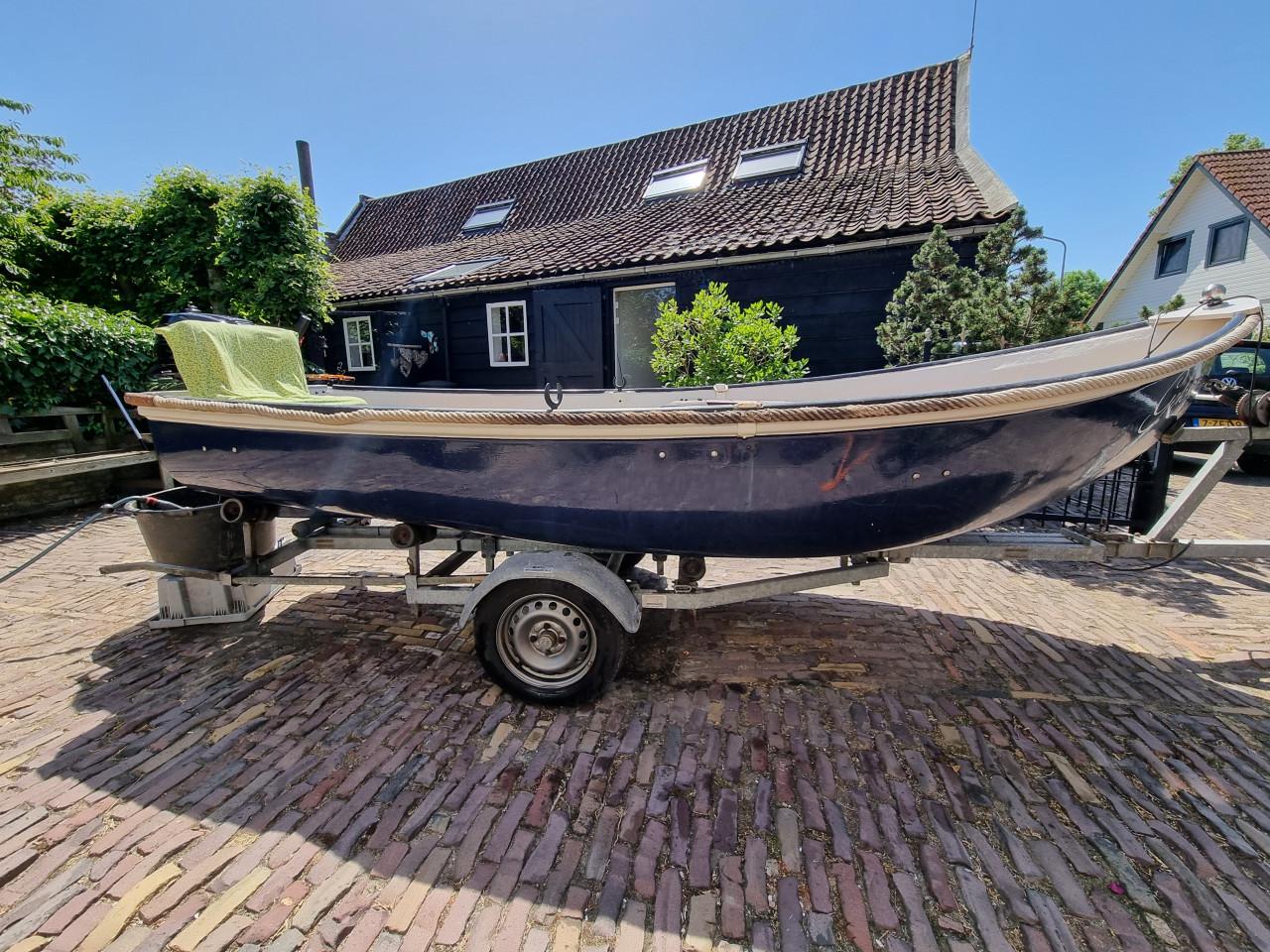 Sloep met 6pk suzuki