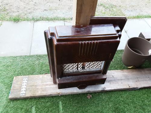 Antieke  kachel  wie doet er een bod