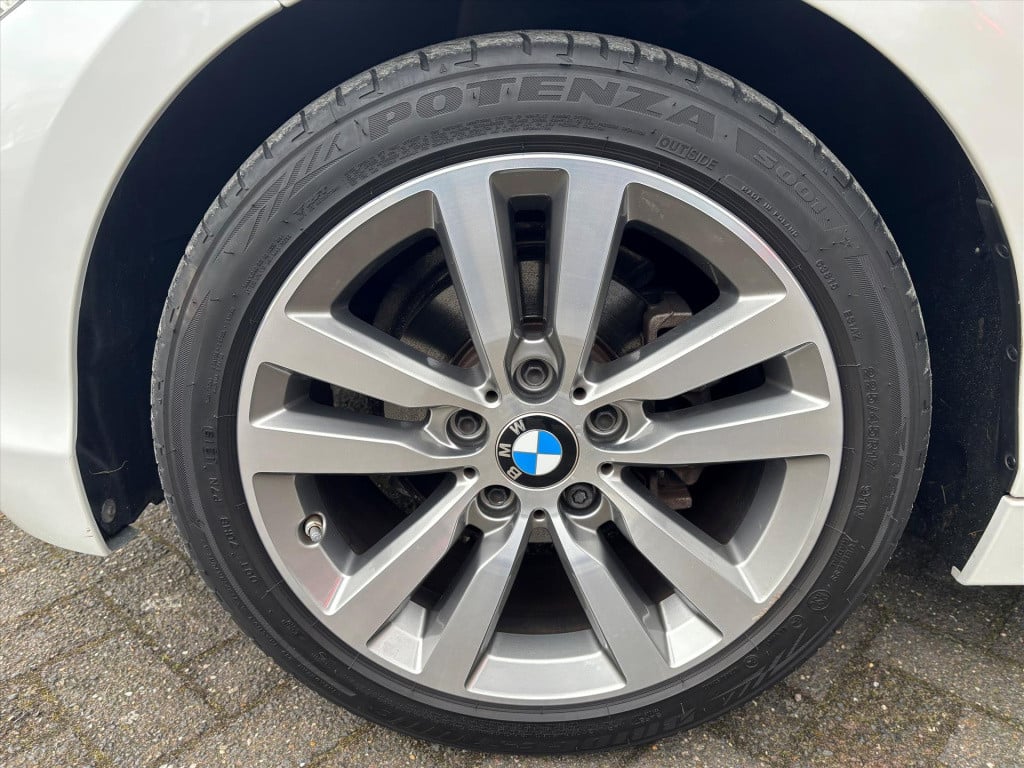 BMW 1 Serie (f20) 118i 136pk aut steptronic sport line | unieke km stand|ri