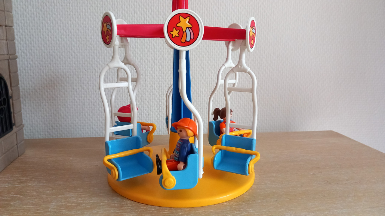 Playmobil draaischommel met 3 kinderen