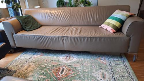 Montel 3-zit lederen bank met voetenbank