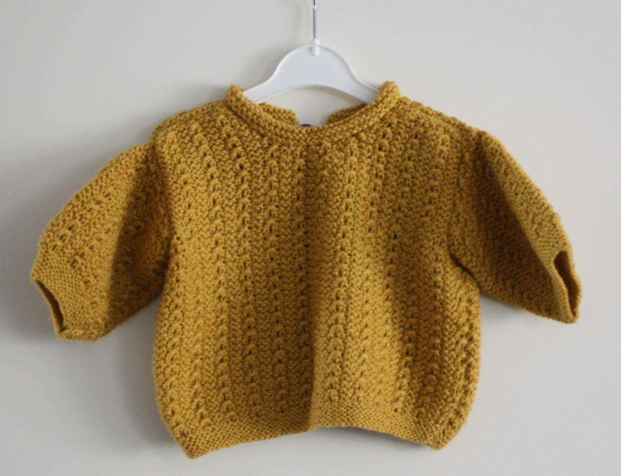 Gebreid mosterdgele trui