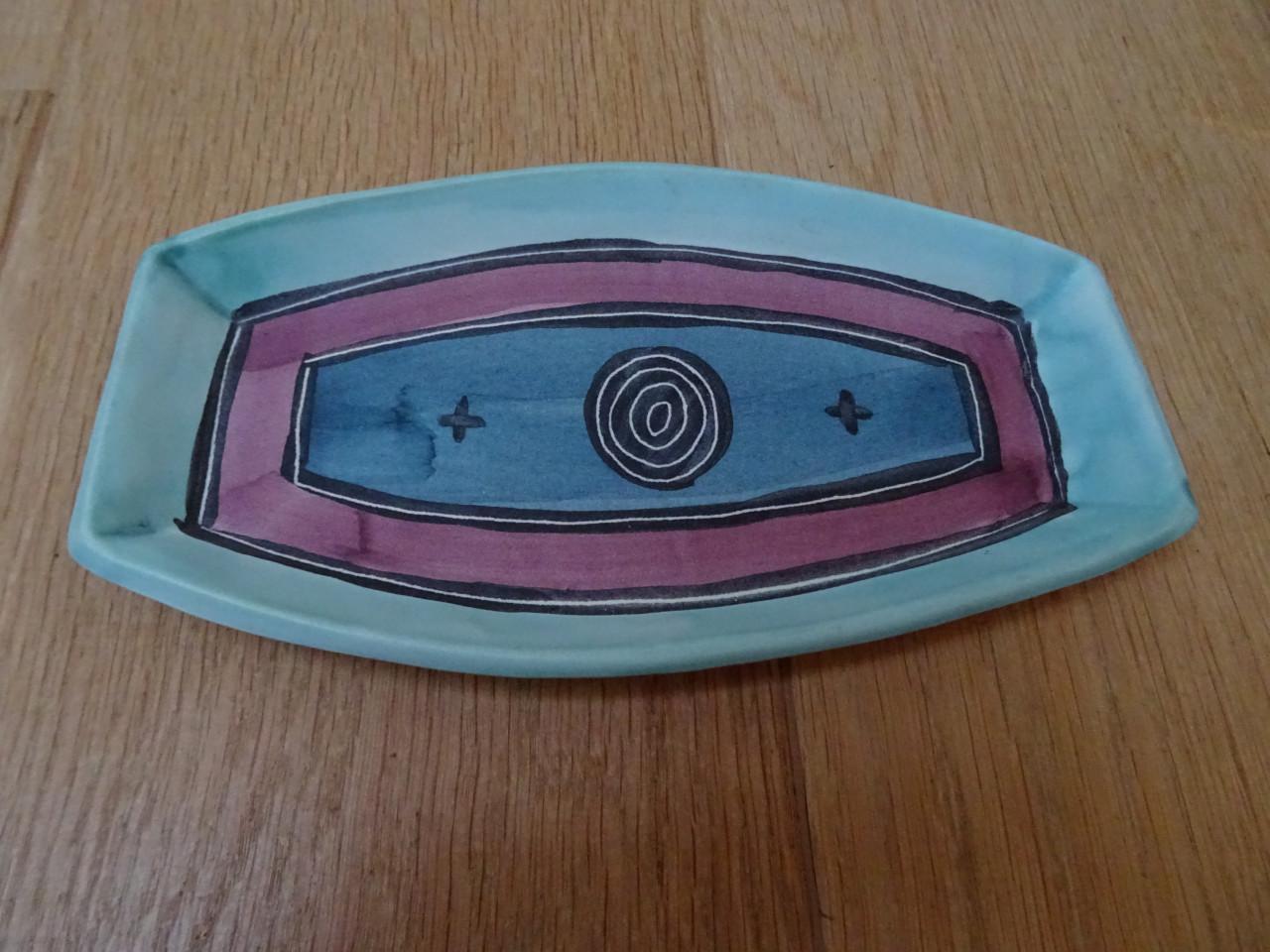 Bijzondere designkopjes op plateautje