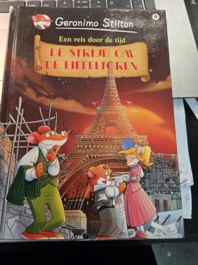 Boek Geronimo Stilton: De strijd om de eiffeltoren 2013 1e druk