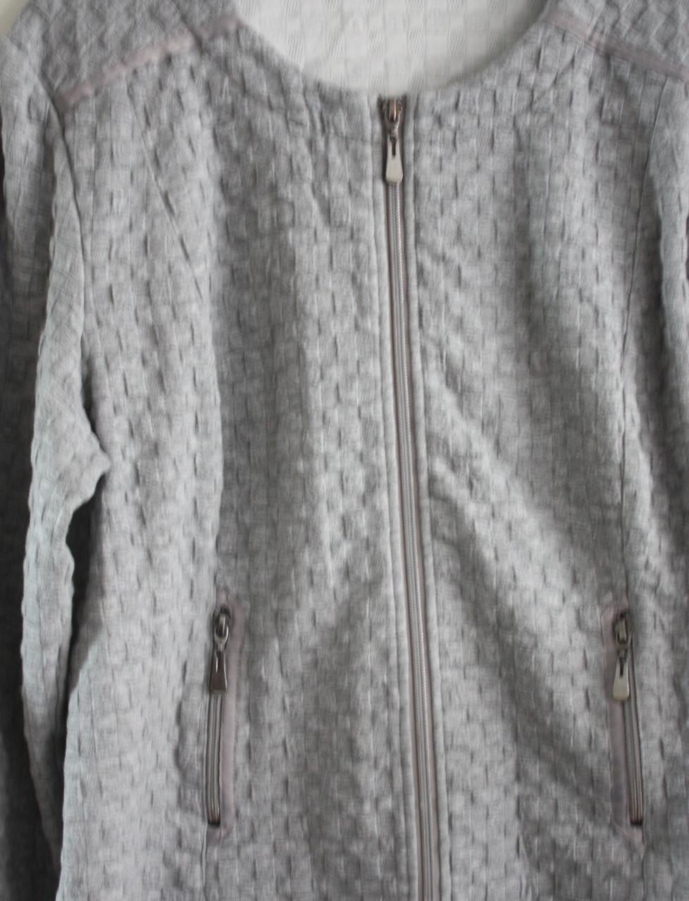 Grijze vest met rits maat L