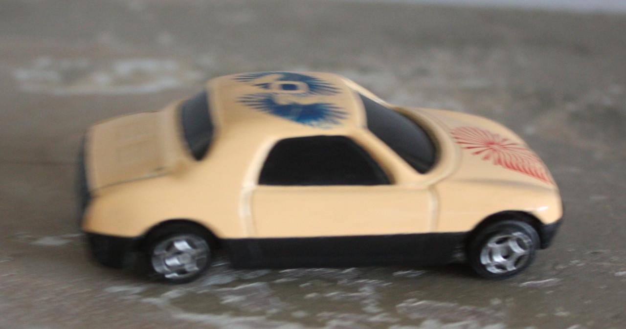 Speelgoed auto beige auto