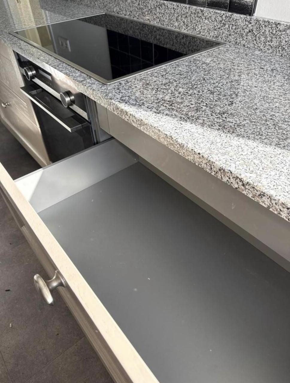 Complete hoekkeuken met Quooker, Siemens en Atag apparatuur