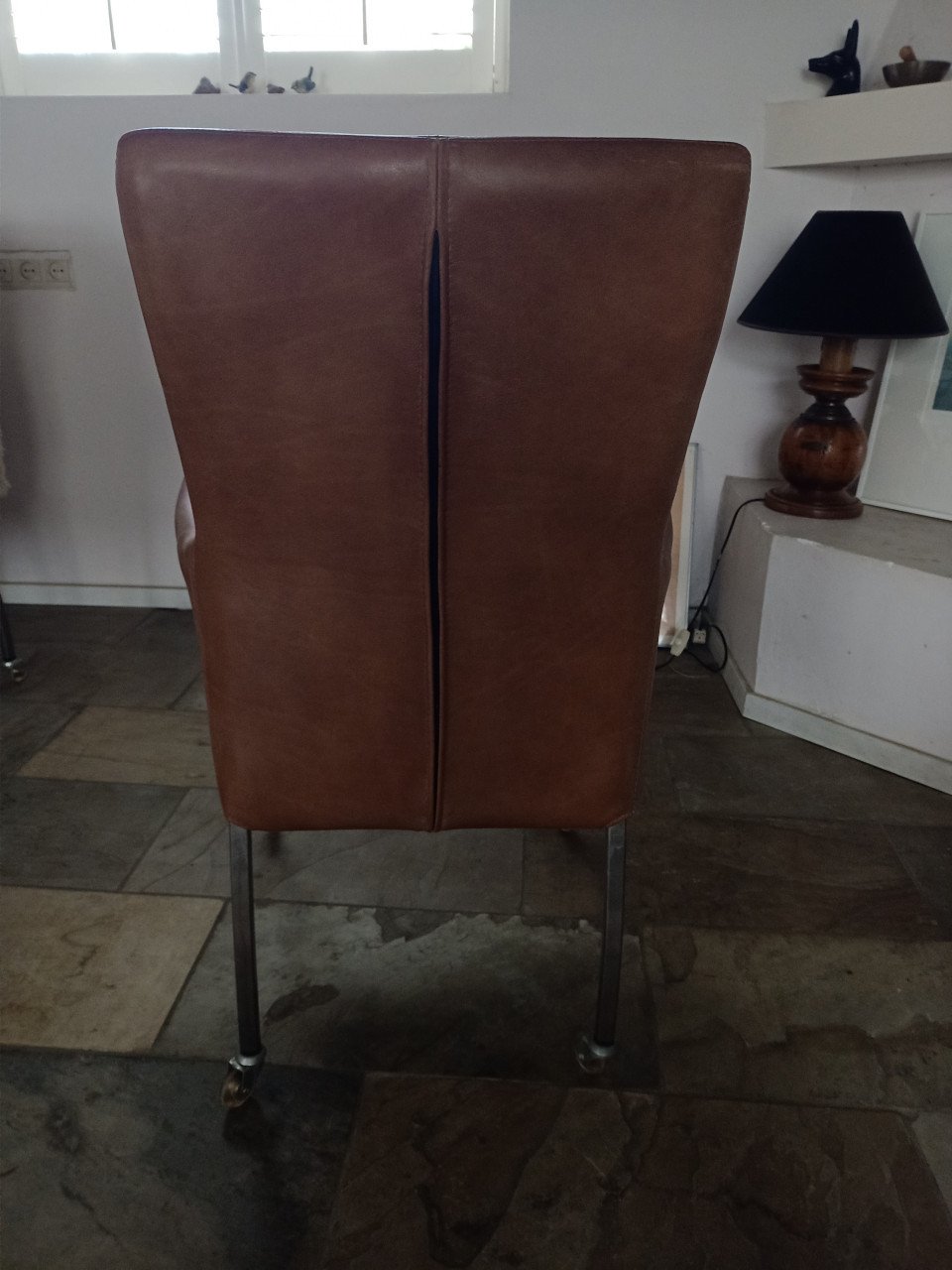 Lederen eetkamer stoelen op wieltjes