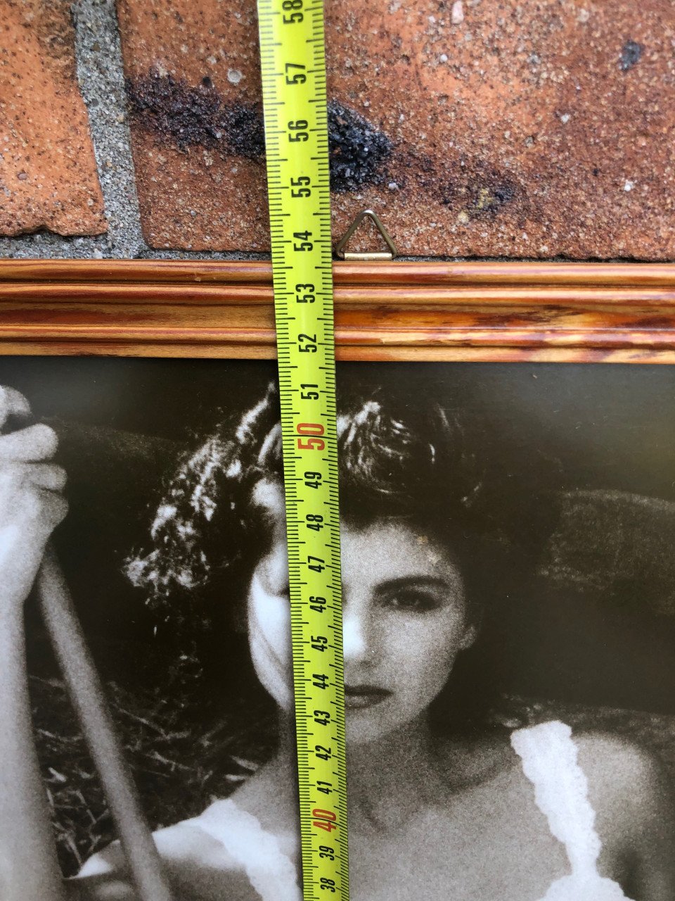 Zwart/wit foto ingelijst achter ontspiegeld glas.