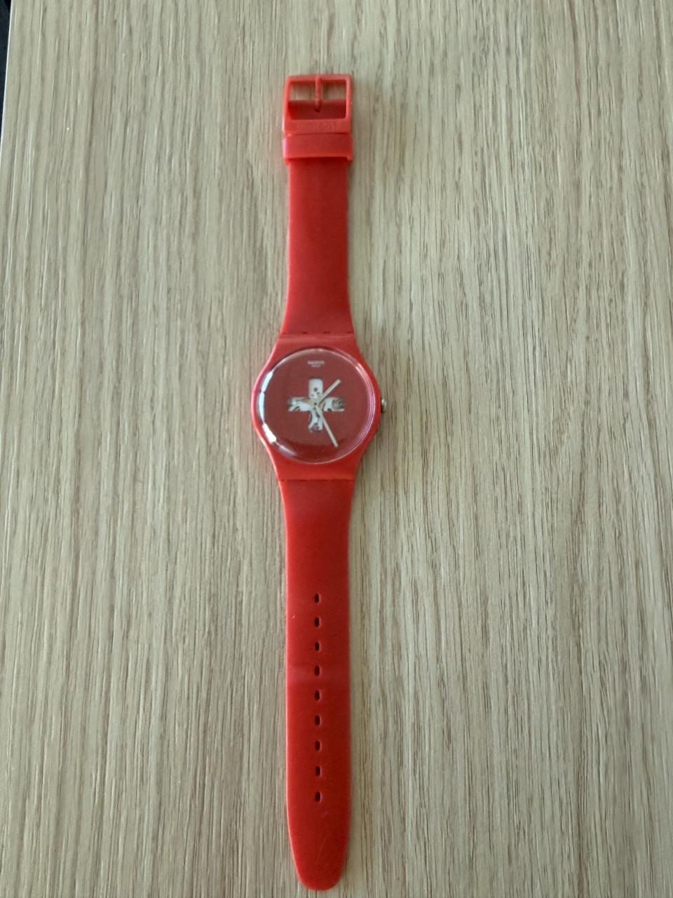 Swatch horloge rood. Swiss around the clock SUOR106
