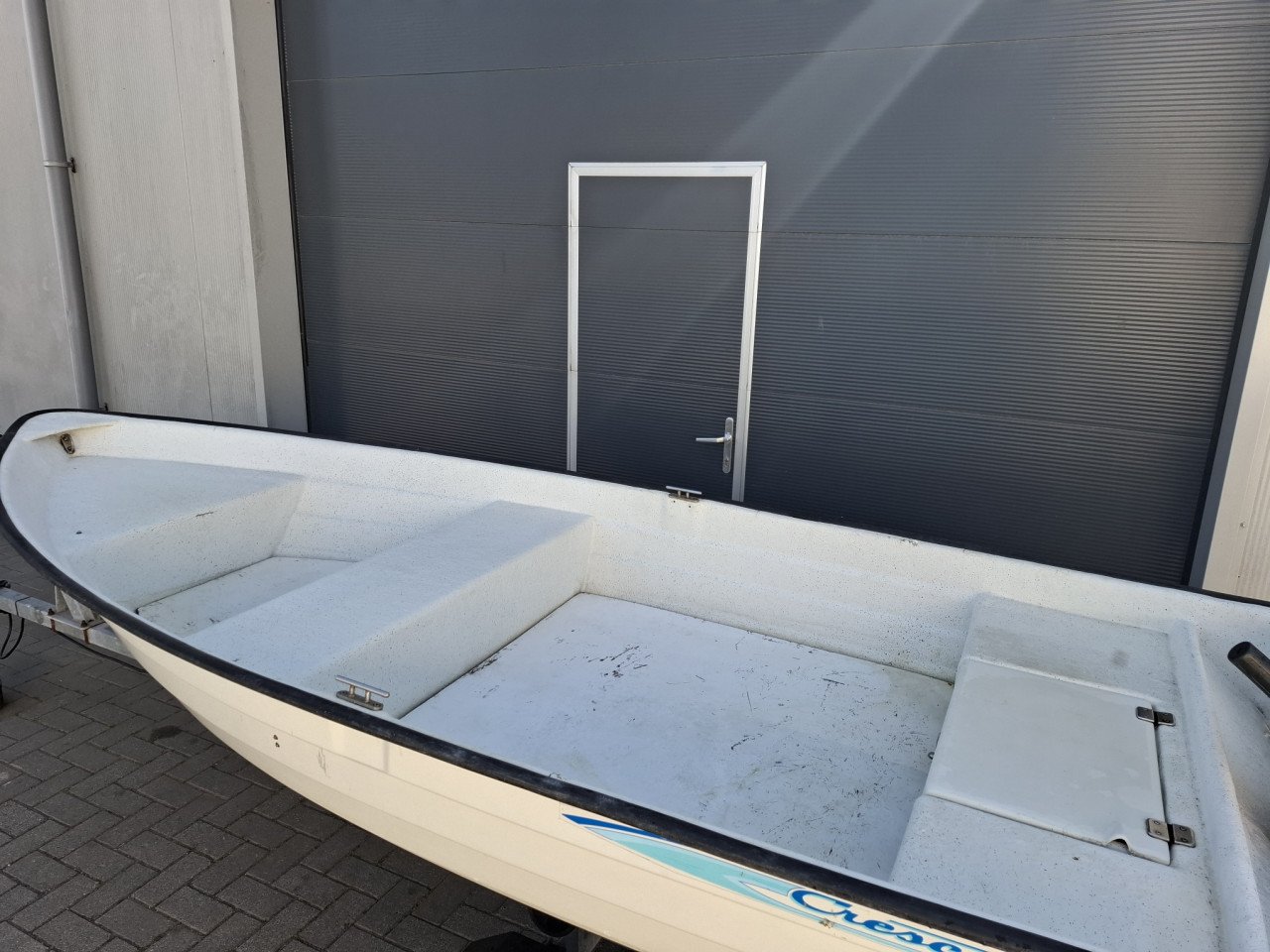 Cremo Crescent 380 met Suzuki 6pk 4takt en Kalf trailer
