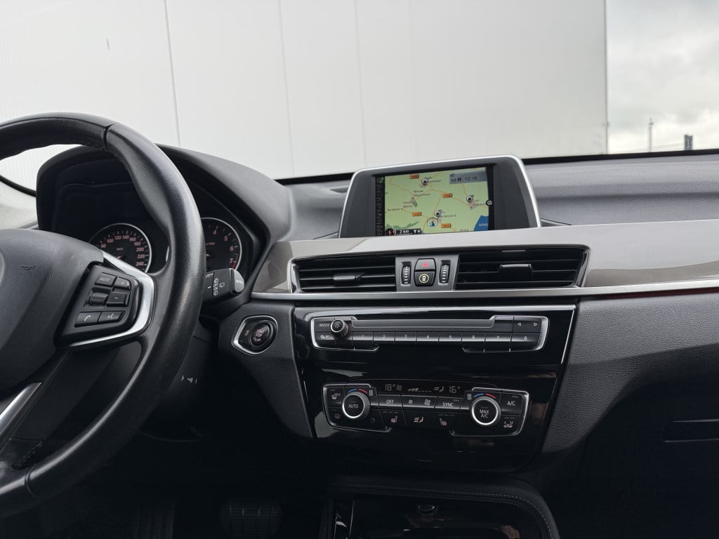BMW X1 sdrive18i 136pk high executive automaat