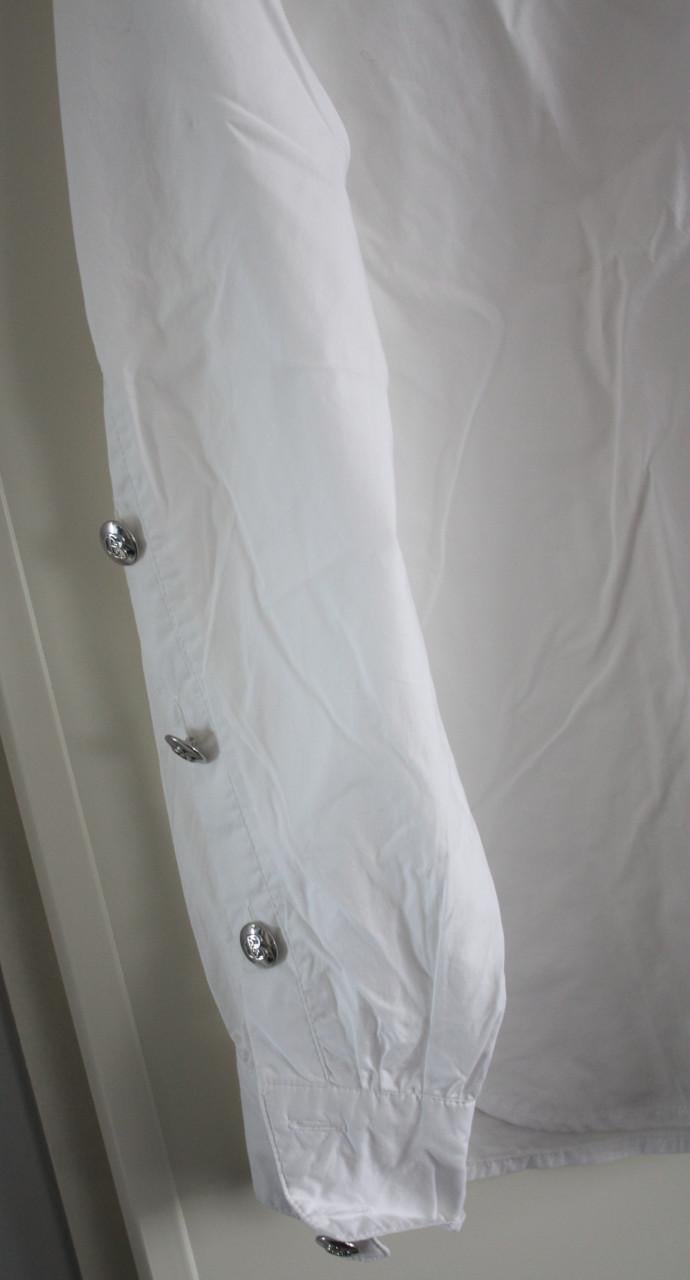 Witte dames blouse et knopen aan de mouwen  maat 42