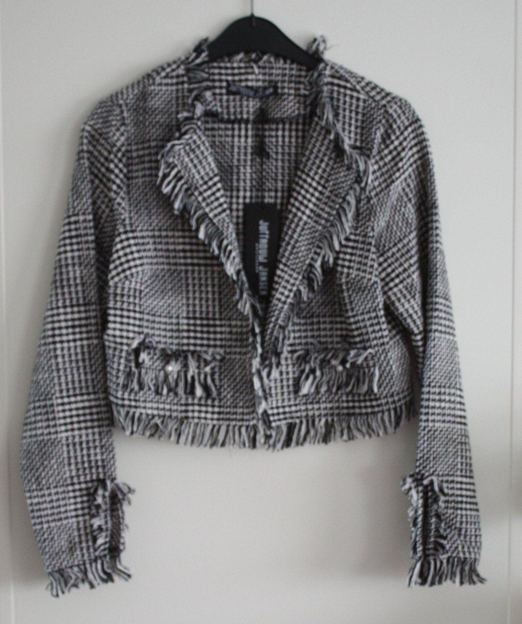 Nieuwe blazer zwart wit geweven gebreid  maar s