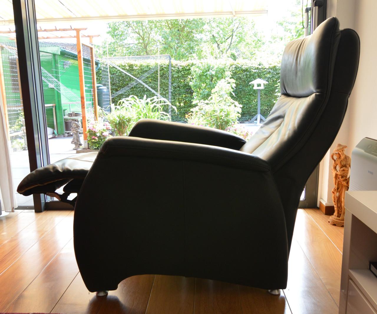Uitklapbare lederen fauteuil