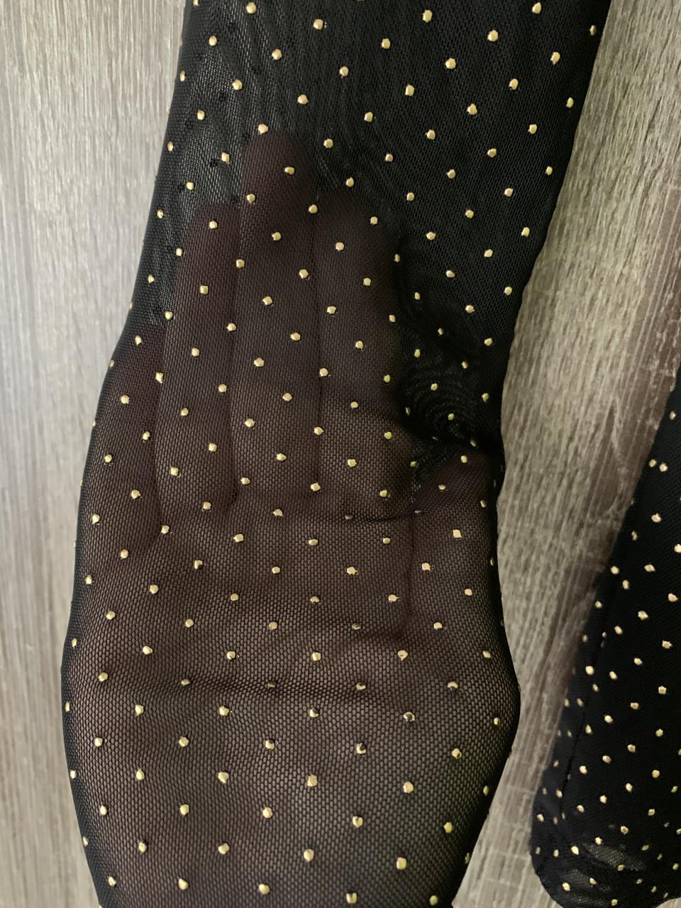 Zwarte top met gouden glitters