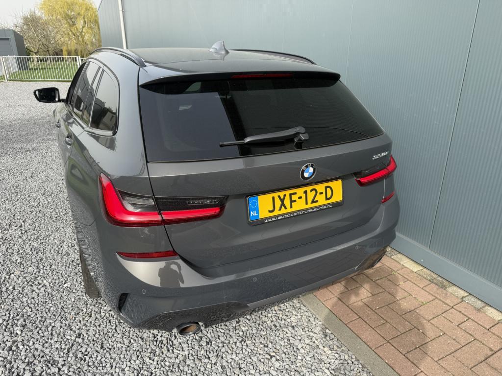 BMW 3-serie touring 330e automaat high executive m-sportpakket