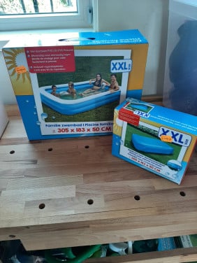 Xxl opblaaszwembad met afdakzeil