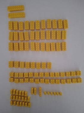 Zakje gesorteerde gele legoblokjes