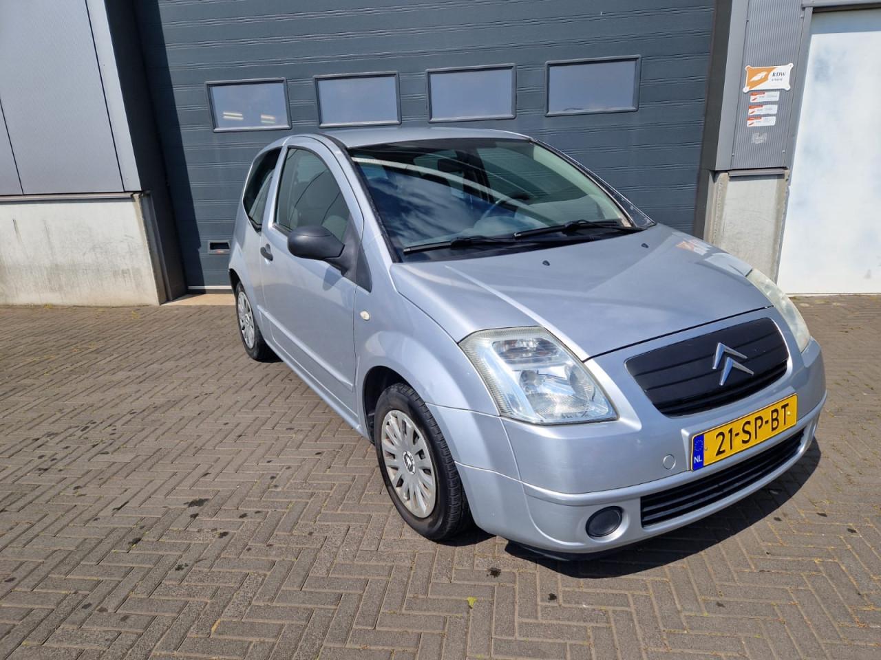 TE KOOP CITROEN C2 1.4i ATTRACTION MET AIRCO EN TREKHAAK 1499,- EURO