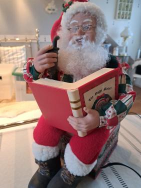 Bewegende kerstman die verhaal verteld