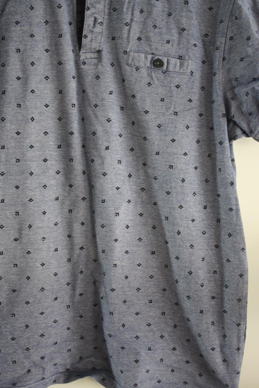 Blauwe polo shirt met patroon maat L