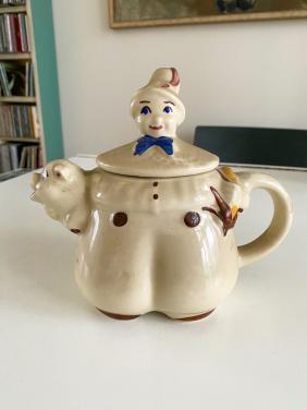 Teapot en borden.