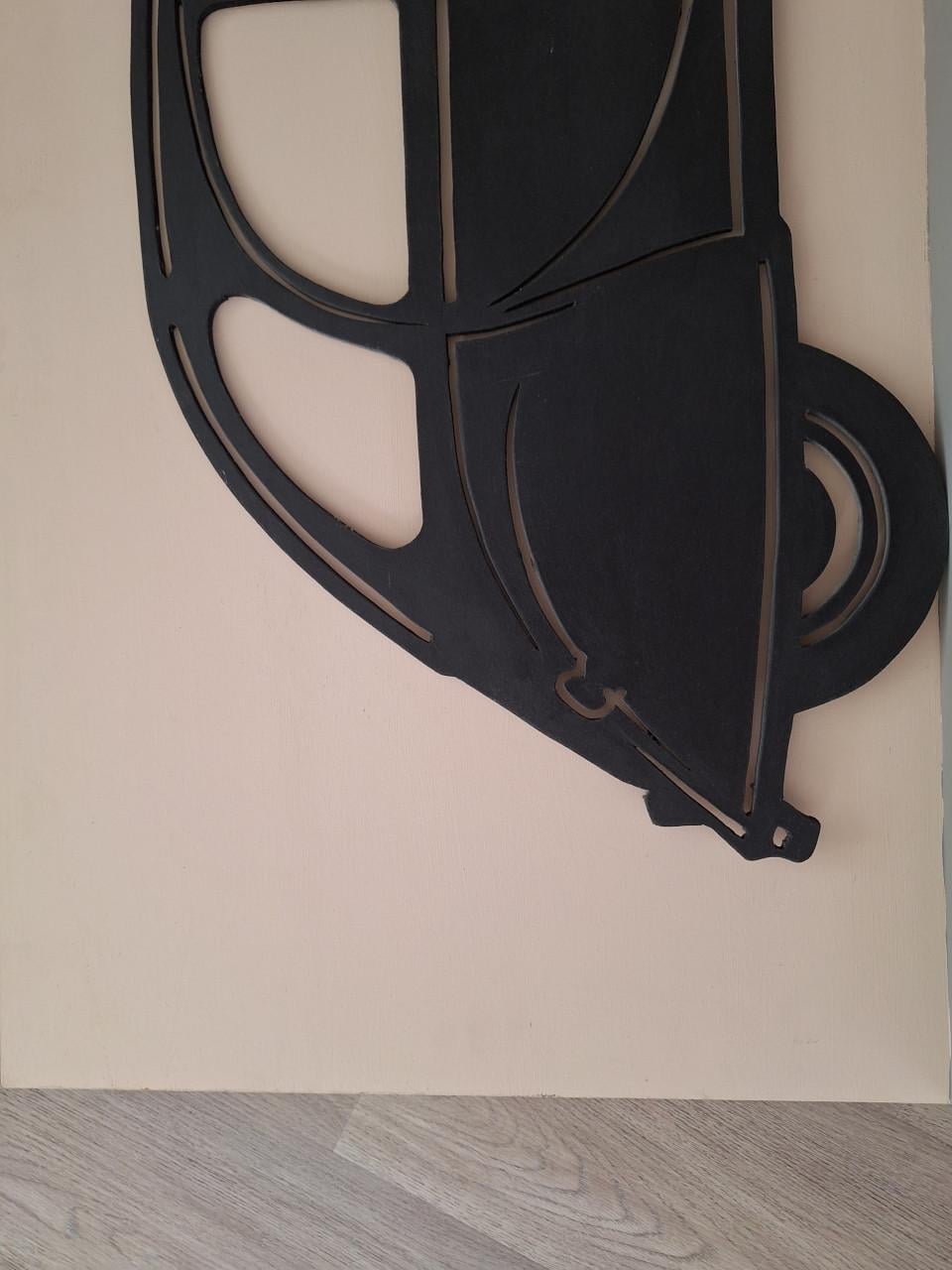 Citroën 2CV aan de wand