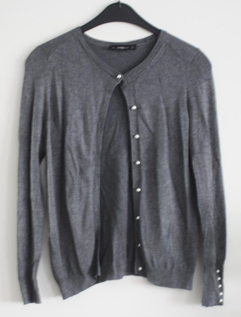 Grijze vest met pareltjes  maat s
