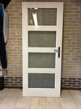 Houten binnendeur met glazen panelen