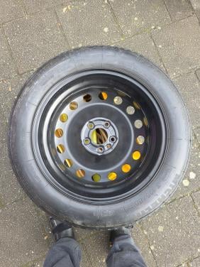 Thuiskomer (reservewiel)