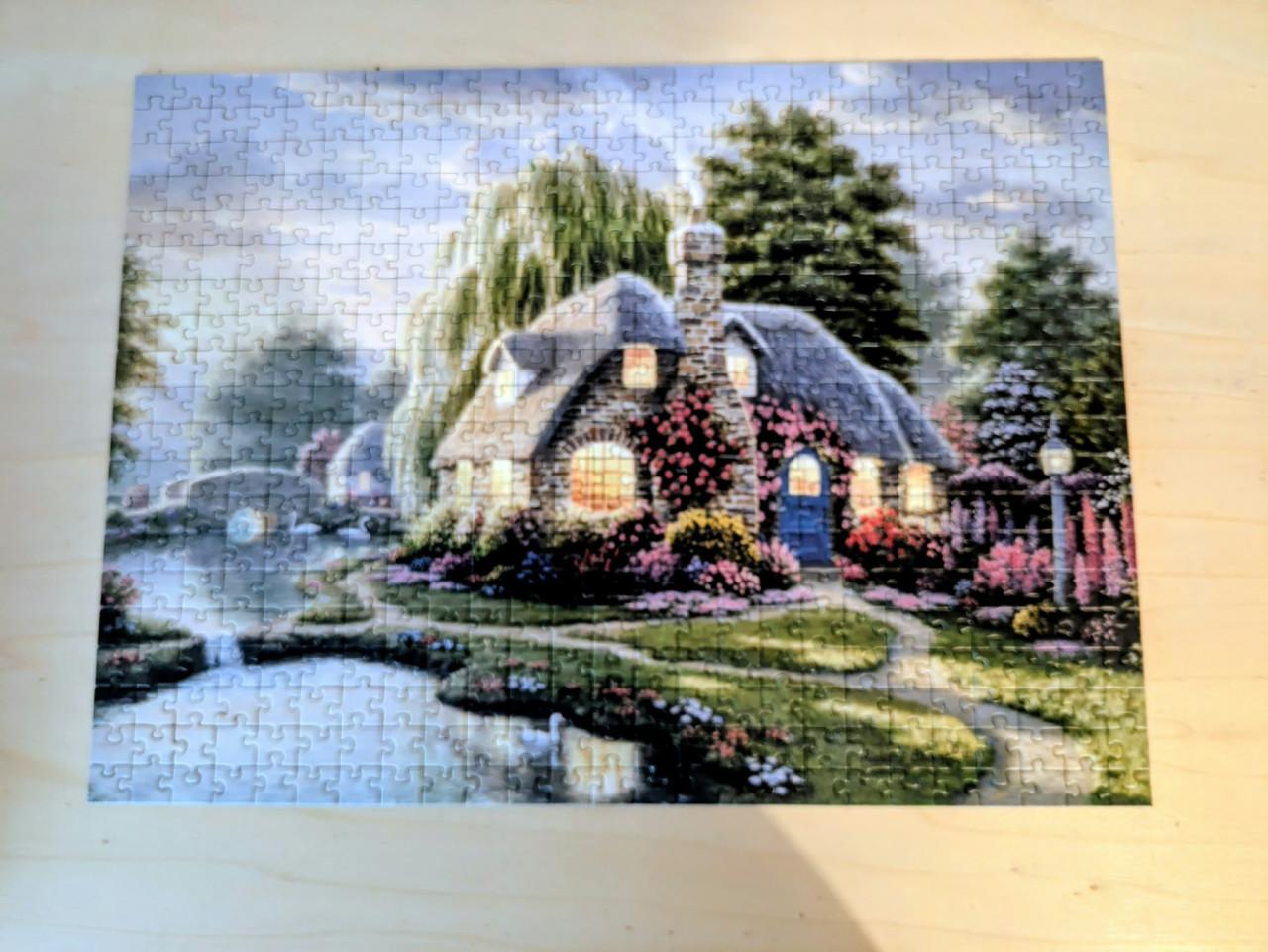 Puzzel Cottage aan een meer