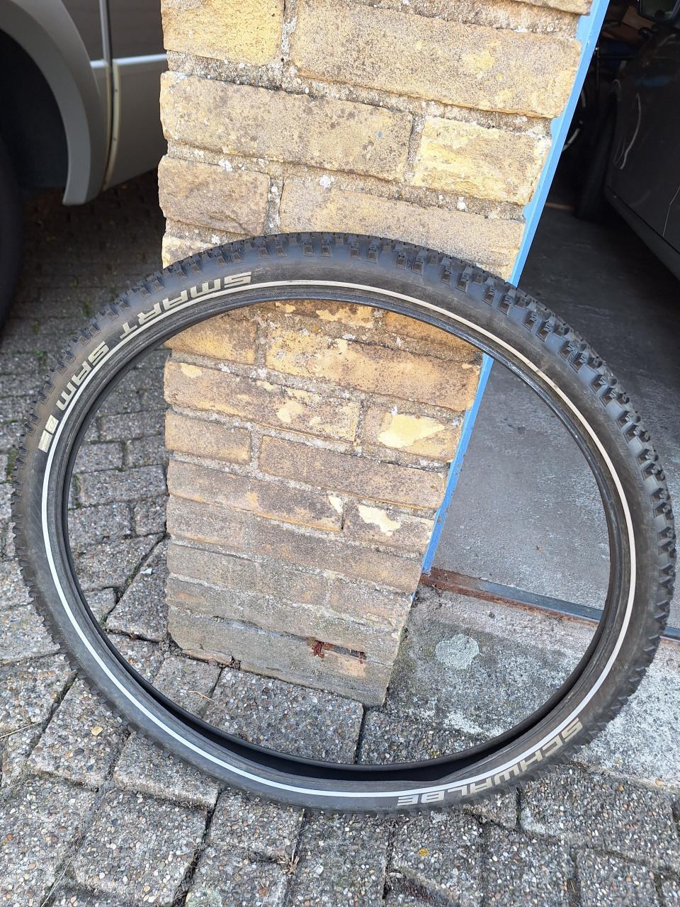 Gratis Schwalbe Smart Sam MTB band 26x2.10 inch.
