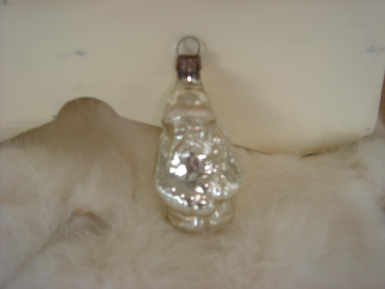 Te koop Oude glazen zilveren kerst mannetje