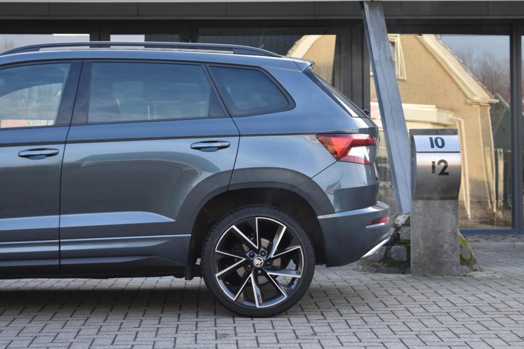 Skoda Karoq 1.5 tsi act sportline | trekhaak | virtual | camera | nap | app