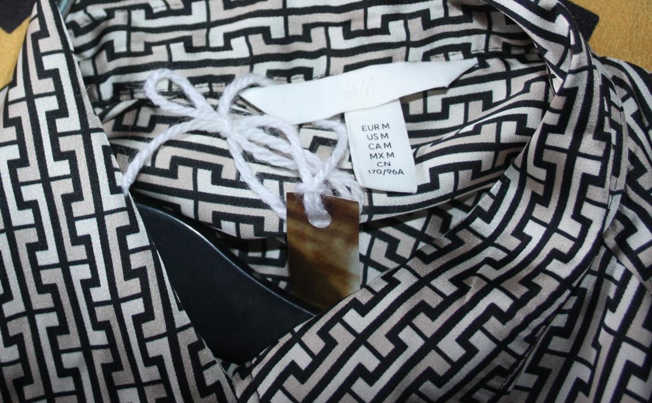 H&M beige zwarte bloes Nieuw zonder prijskaartje Maat M valt heel ruim dus