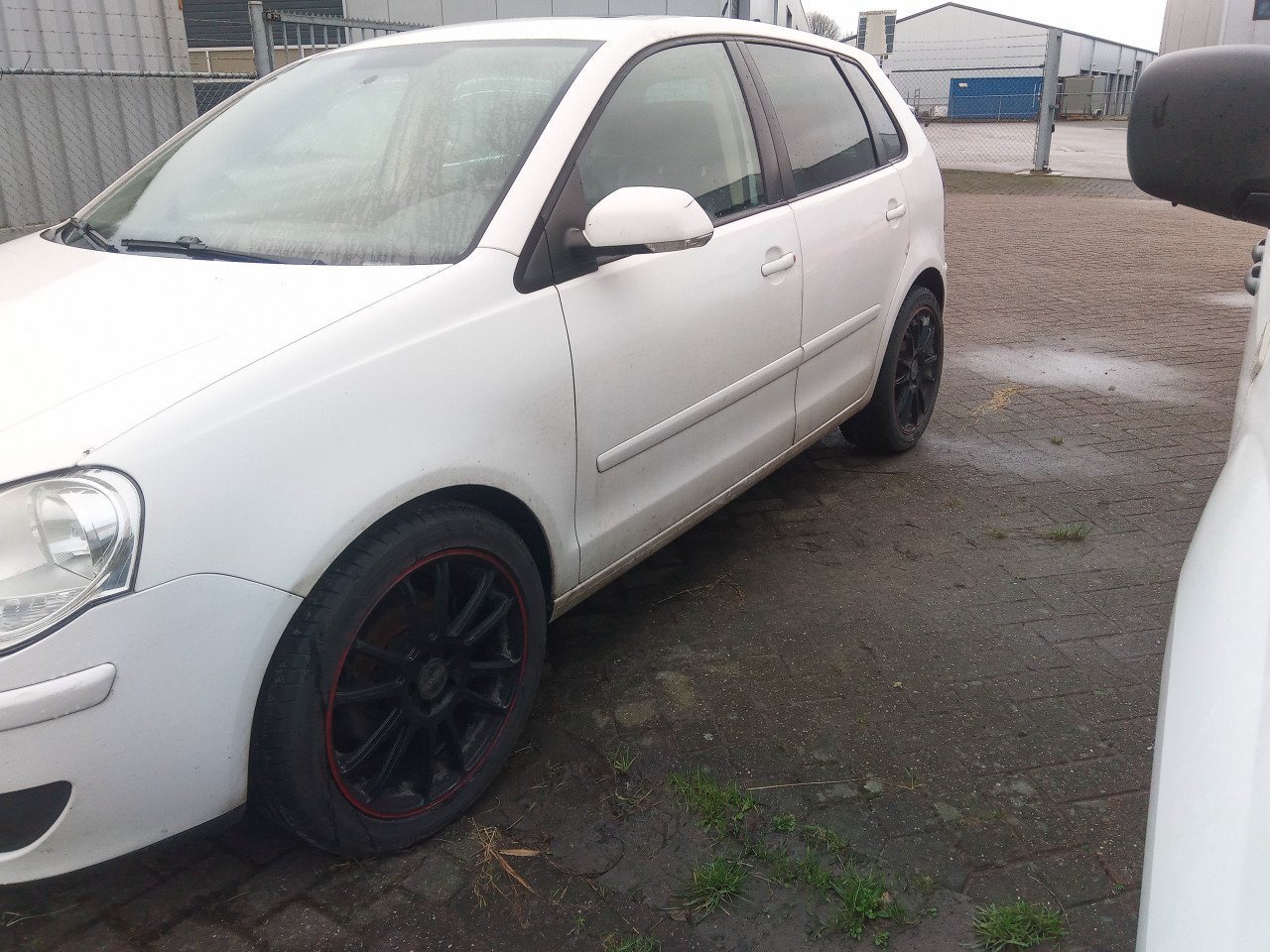VW Polo 1.4 benzine met elektrisch schuifkanteldak,ramen +airco te koop