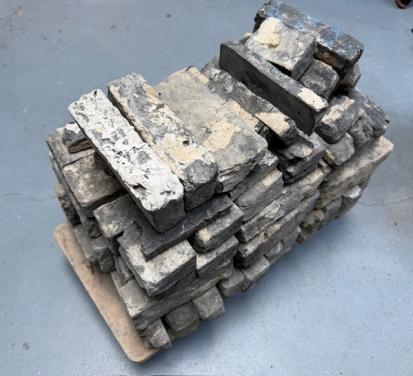 Antieke grijze paepsteentjes