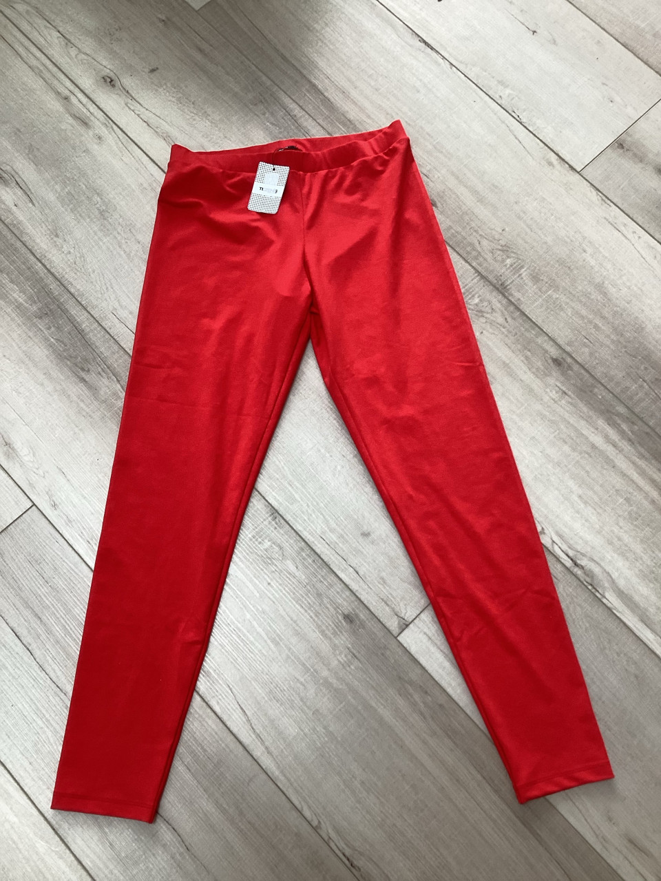 Nieuwe rode legging met kaartje er nog aan maat L