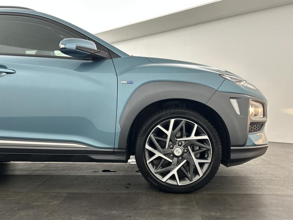 Hyundai Kona 1.6 gdi hev fashion | trekhaak | all-season banden | automaat