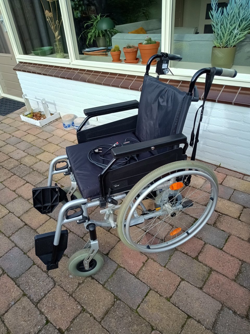 Rolstoel met ondersteuning