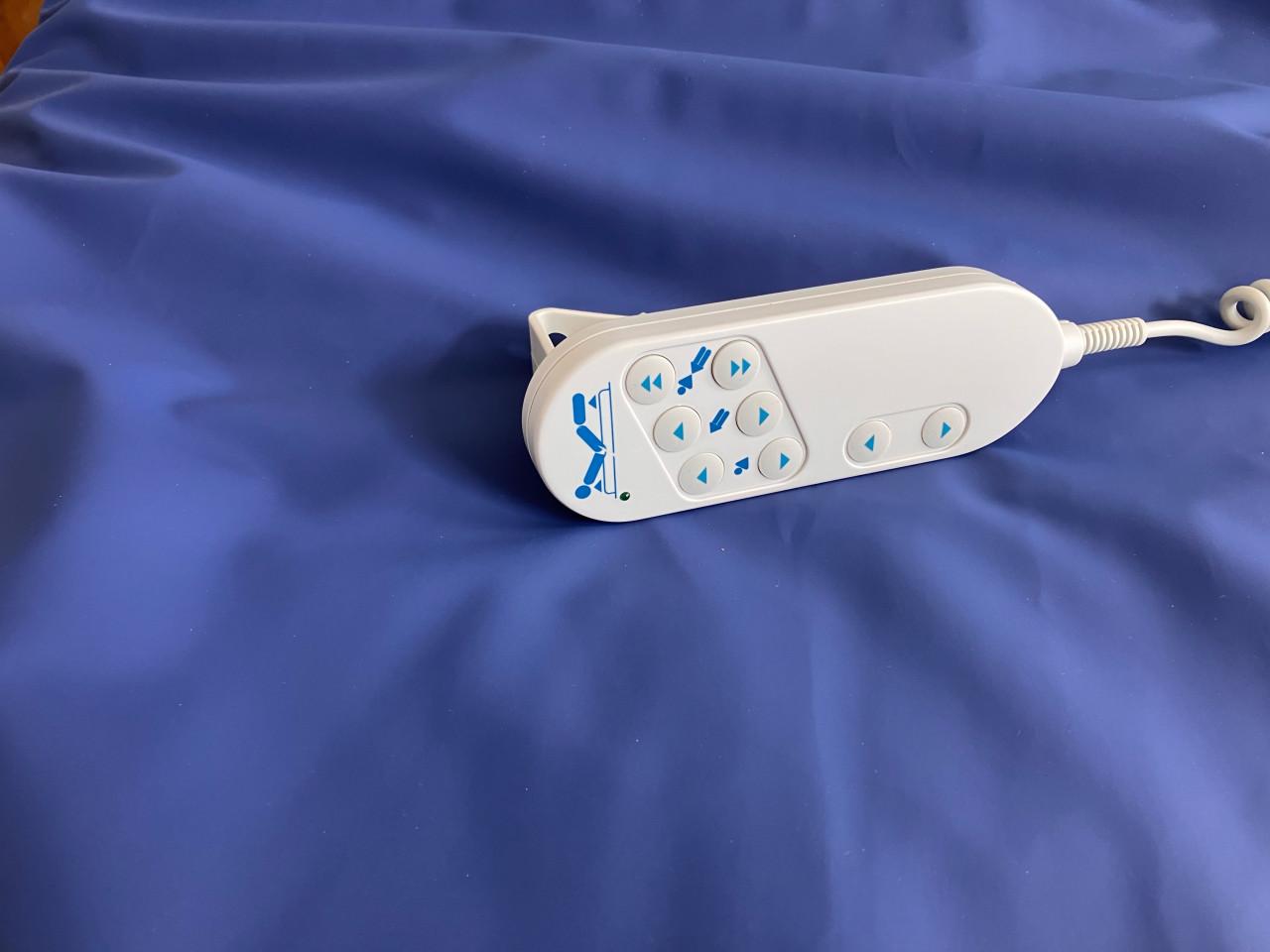 Elektrisch seniorenbed eiken look met papagaai