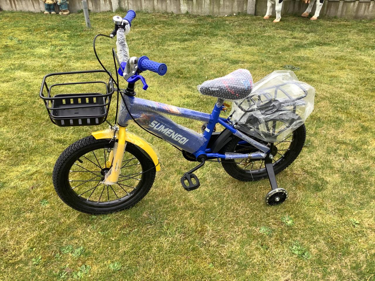 Nieuwe 16 inch jongensfiets met handrem en zijwieltjes voor bodemprijsje